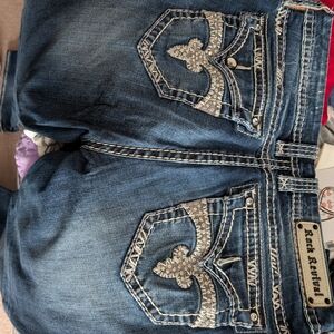 Rock Revival Blue Boot Cut Jeans with Distinctive Embroidery